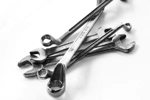 Combination wrenches from a garage door technician's kit