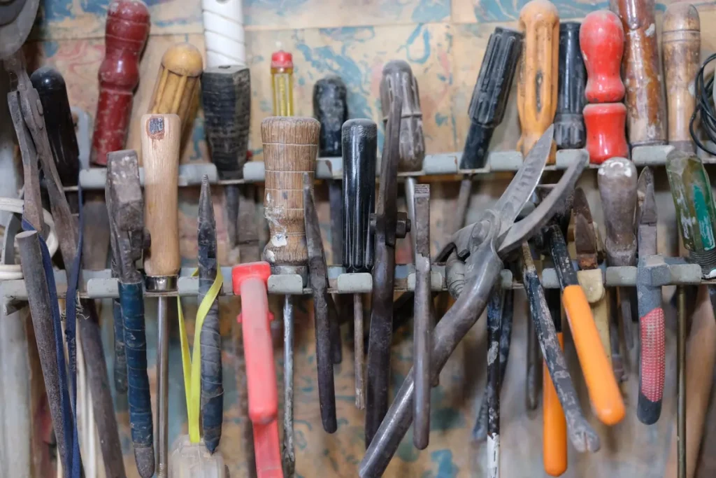 Rack of well-used hand tools