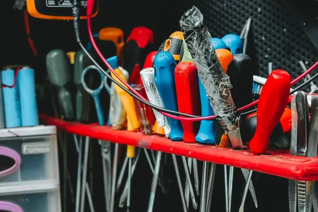Pegboard with pliers, screwdrivers and a multimeter